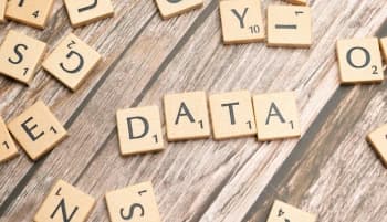 data written in scrabble pieces