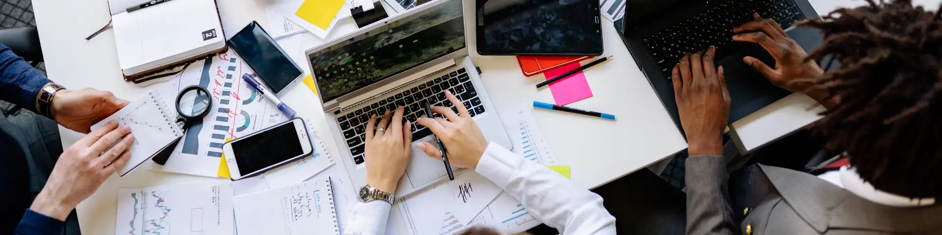 people working at an office desk